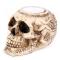 small skull-shaped candle holder - 3 different models