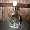 Botella de cristal de 200 ml con forma de calavera